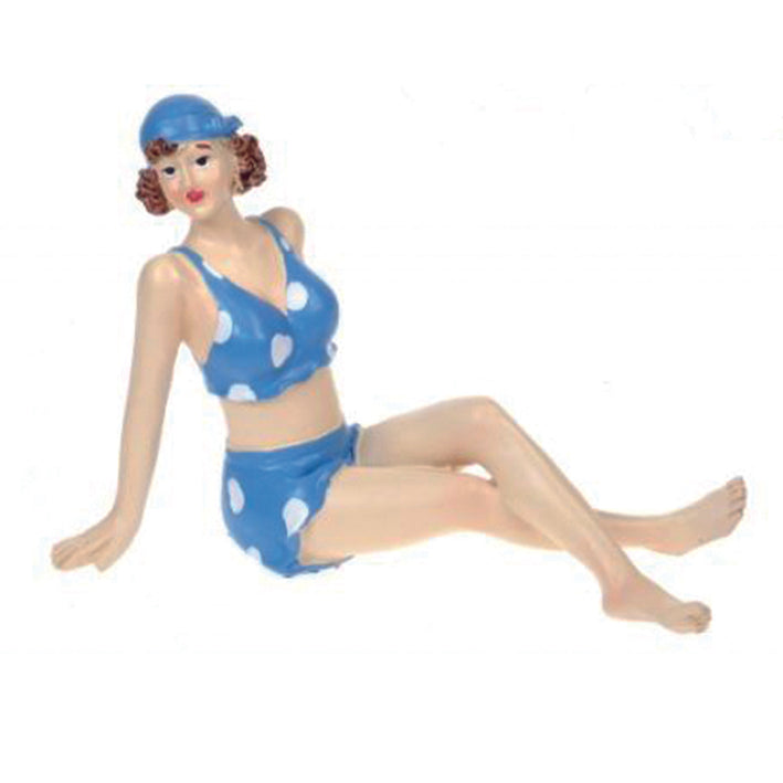 Beach Glamour Girl sitting in blue costume