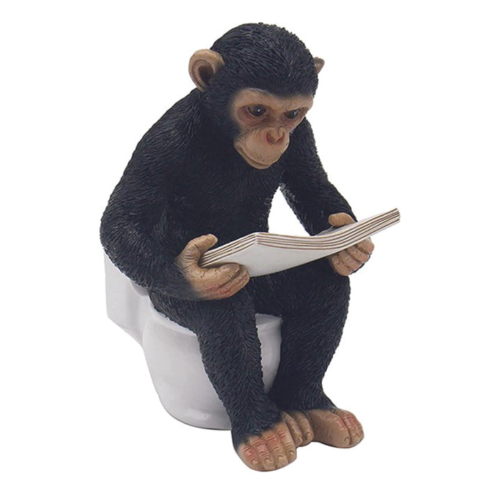 Cheeky Monkey Reading on the Toilet