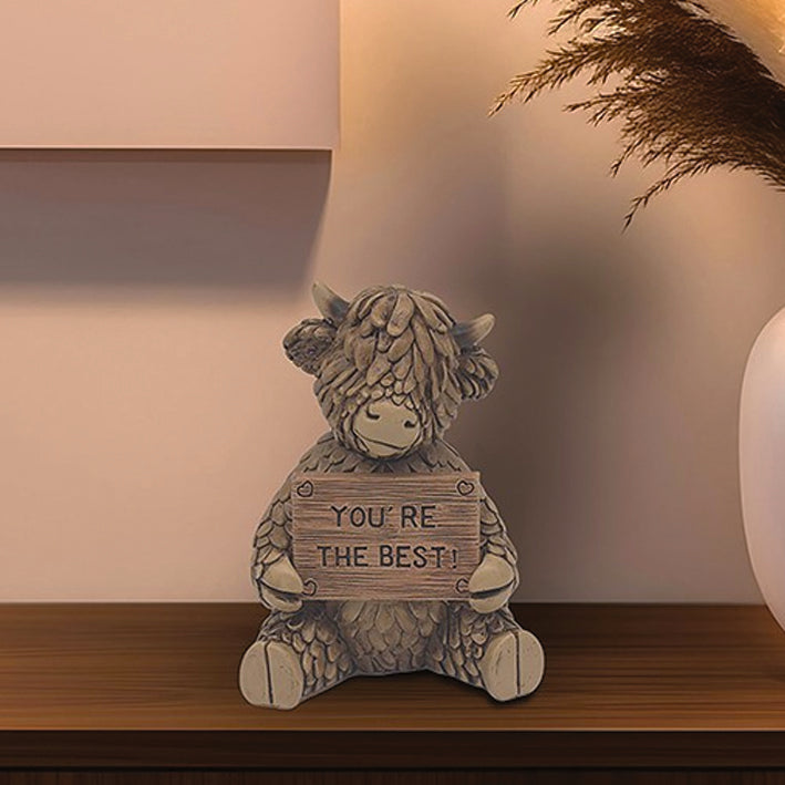 Hughie Highland Cow Sat With a Sign - You're the best