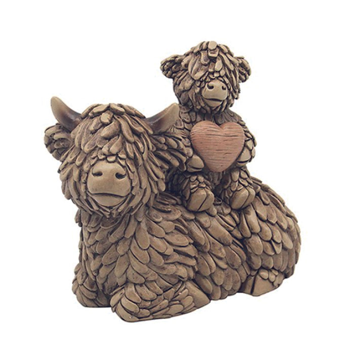 Hughie the Highland Cow, Lying with Baby on Back