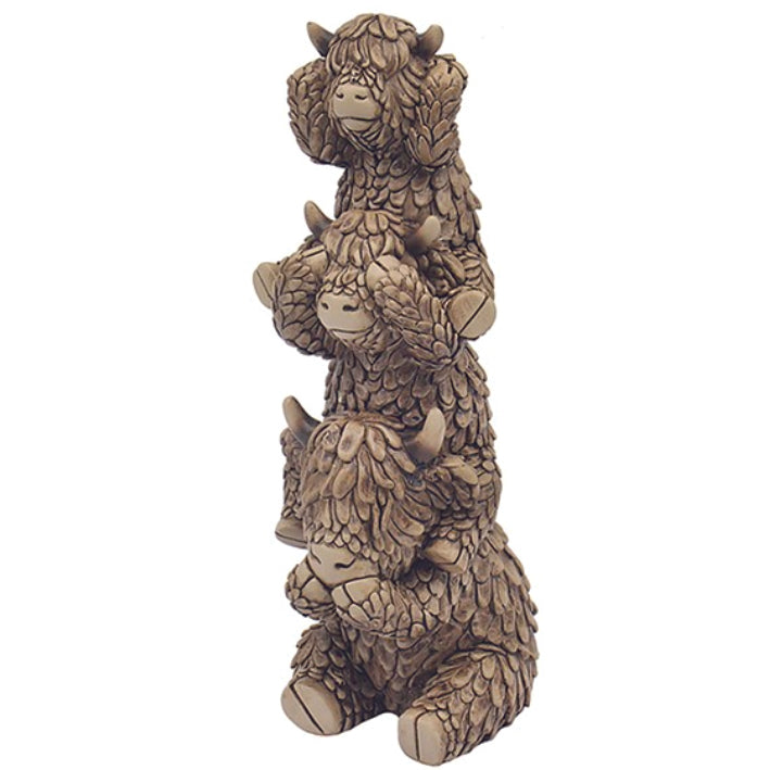 Hughie the Highland Cows, see no evil, hear no evil, speak no evil stacked on top of each other