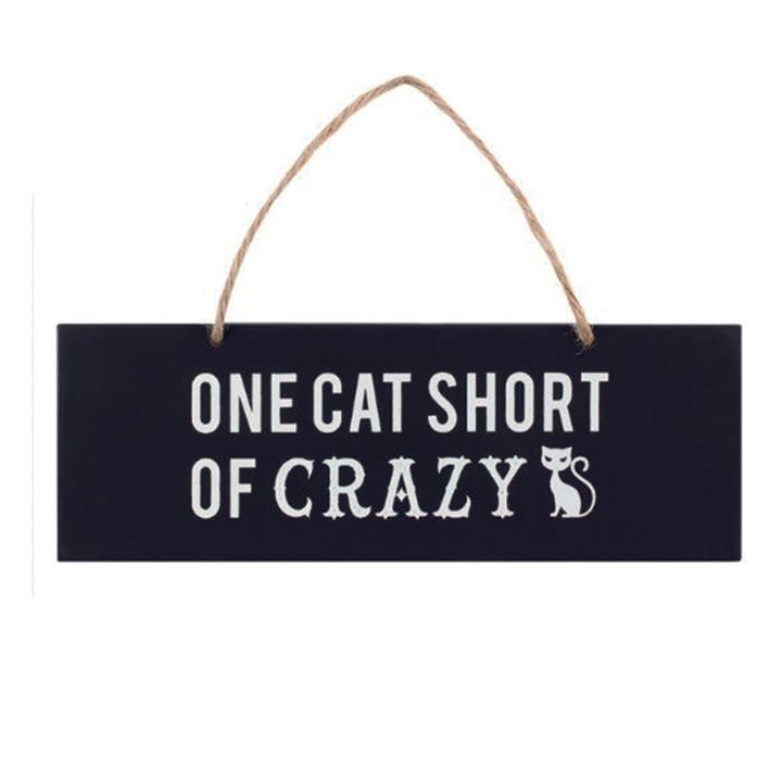 Wooden hanging plaque. One cat short of crazy