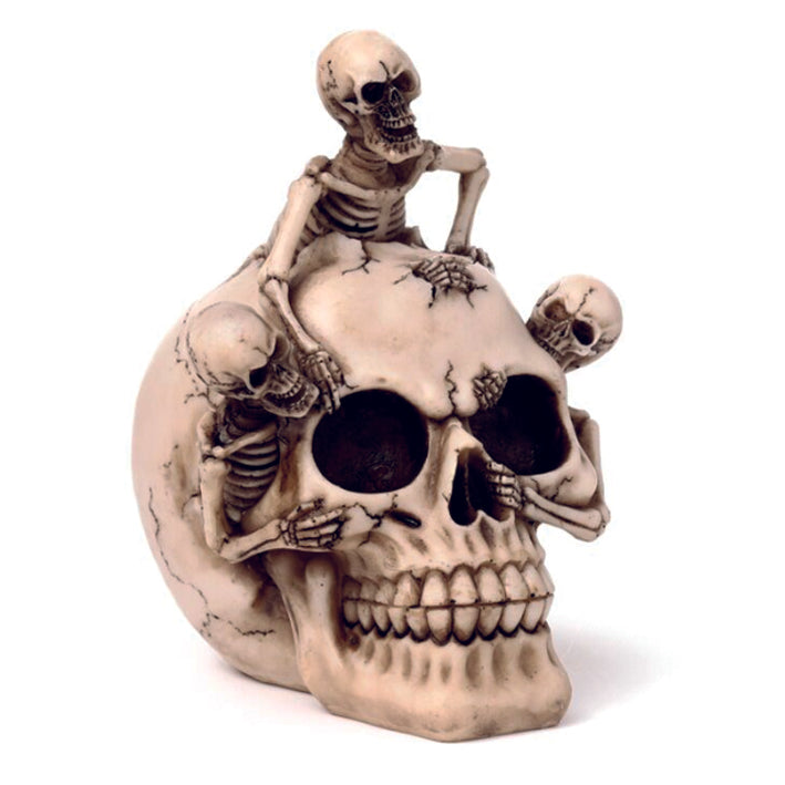 Skull with skeleton bursting out