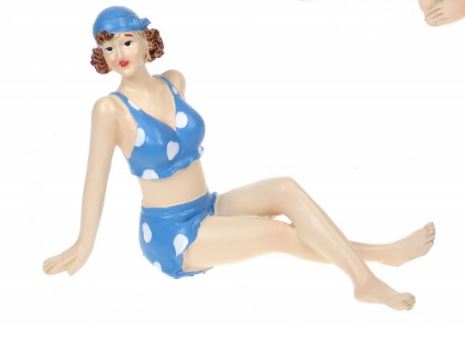 Beach Glamour Girl sitting in blue costume