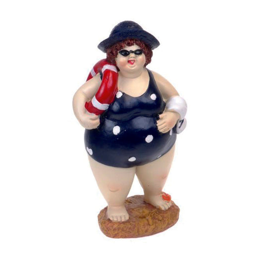 Beach Lady standing with blue costume and hat