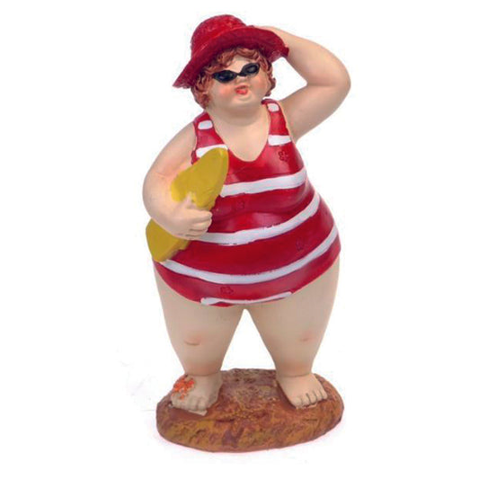 Beach Lady standing with red costume and hat