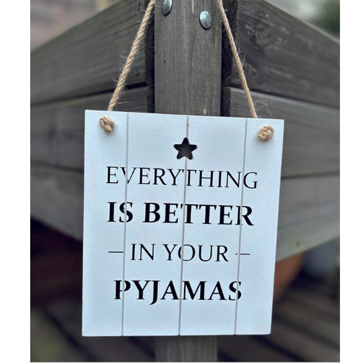 Wooden hanging sign - Everything is better in your pyjamas.  Medium