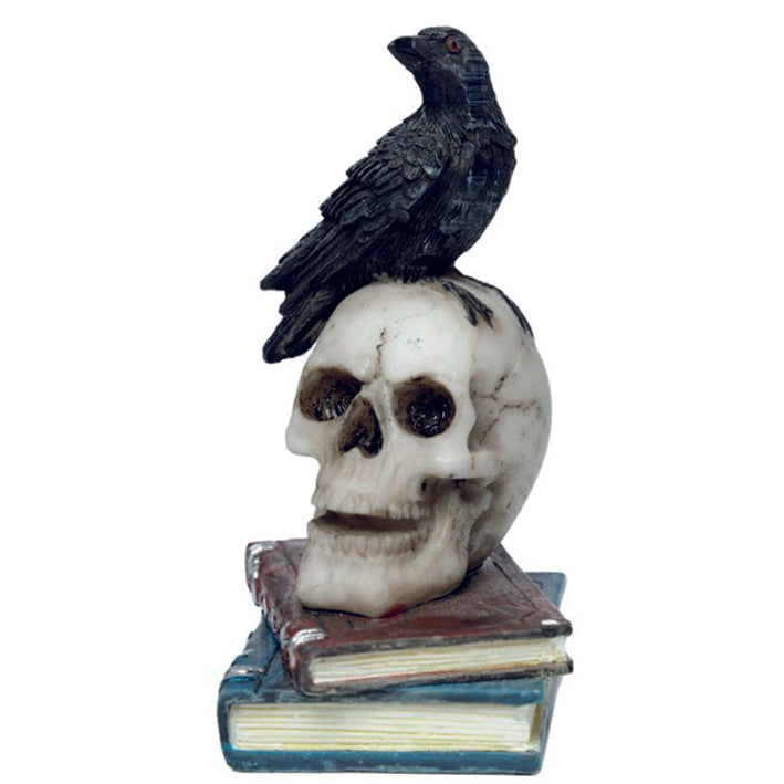 Crow standing on a skull on a pile of books ornament