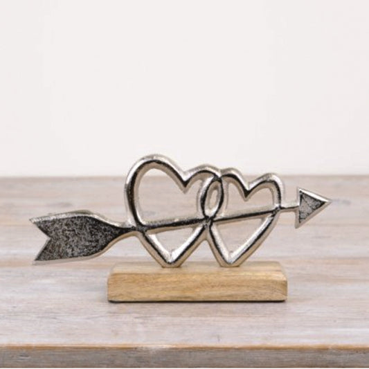 Double heart with arrow mounted on wood ornament