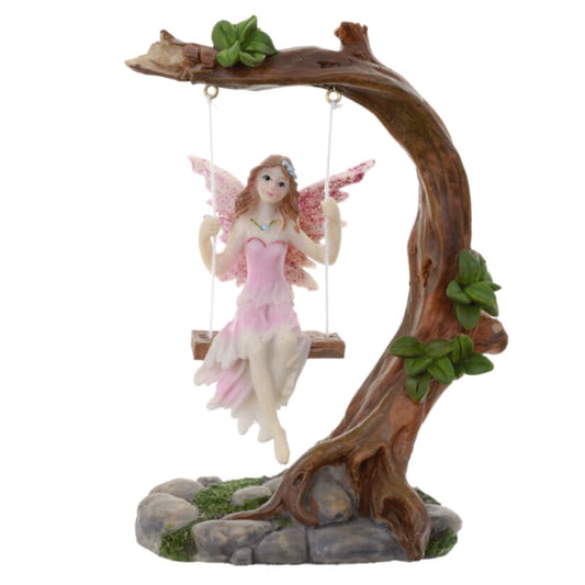 Flower fairy on a swing
