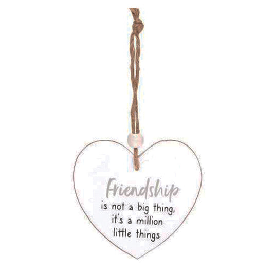 Hanging wooden heart - Friendship is not a big thing, it's a million little things