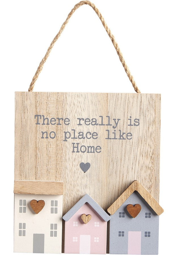 Wooden hanging plaque with 3D houses.  There really is no place like home