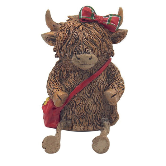 Hughie the Highland Cow ornament, Girl Sitting With Tartan Bow, Bag and Dangly Legs