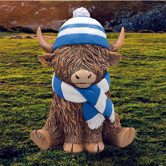 Happy Highland Cow with a blue and white hat and scarf
