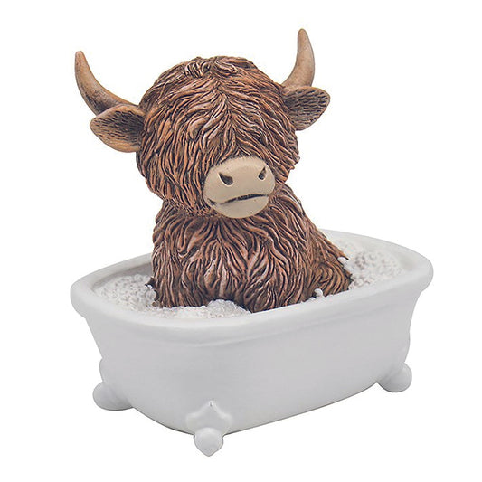 Happy Highland Coo in the bath