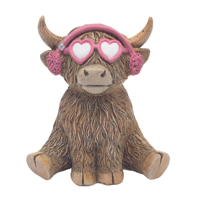 Highland Cow, Sitting with pink ear moo-ffs and pink heart glasses