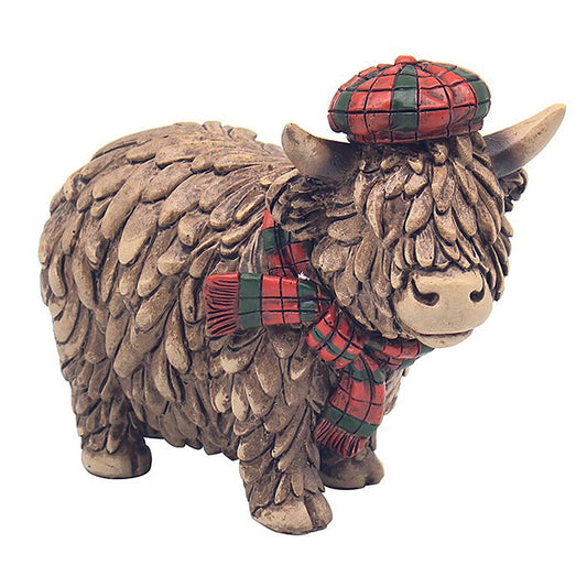 Happy Highland Cow Standing With A Tartan Hat and Scarf