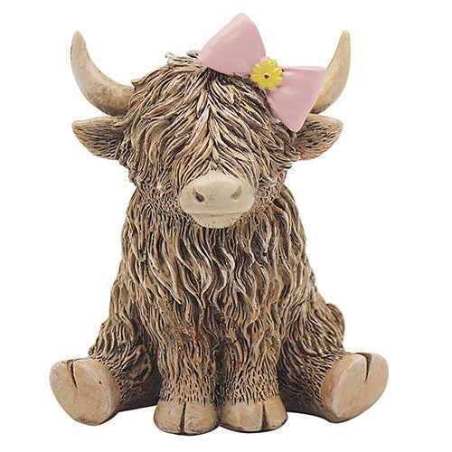 Happy Highland Cow with pink bow on head