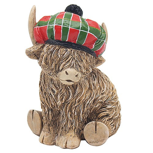 Happy Highland Cow with a tartan hat