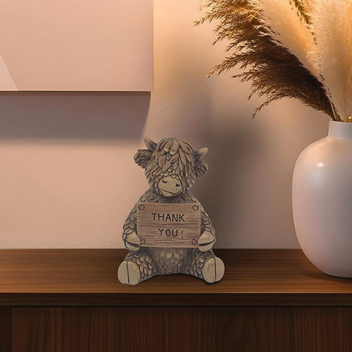 Hughie Highland Cow Sat With a Sign - Thank You