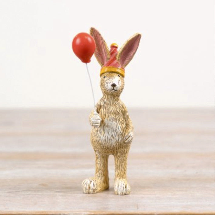 Jasper the Rabbit ornament holding a red baloon