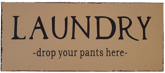 Hanging wooden sign.  Laundry - drop your pants here