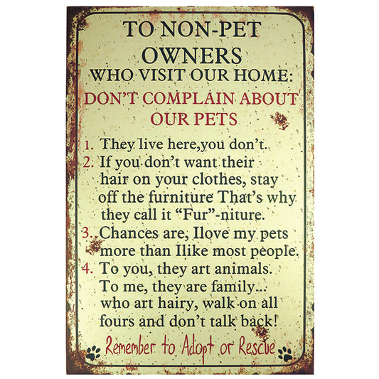 Large wooden sign. To Non Pet Owners