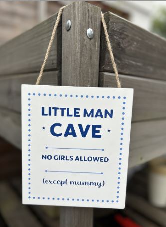 Wooden hanging sign.  Little man cave