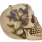 Med skull with purple roses around head