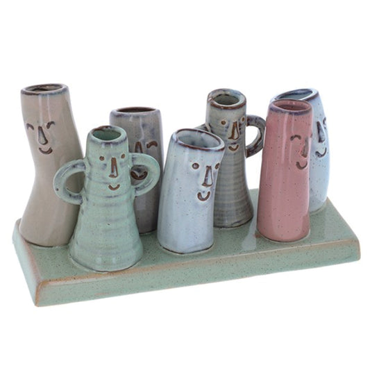 Petite Pottery 7 mini stem vases  with faces on a base