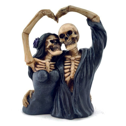 Skeletal Couple With Arms In A Heart