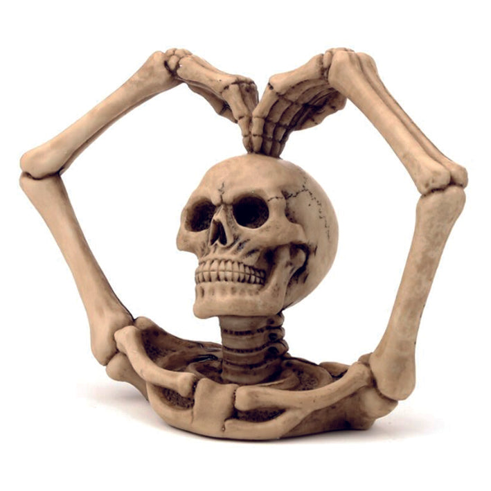 Skull with skeletal arms in a heart