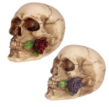 Small skulls with rose in teeth
