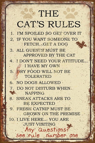 Large wooden sign. The Cat's Rules