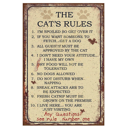 Large wooden sign. The Cat's Rules