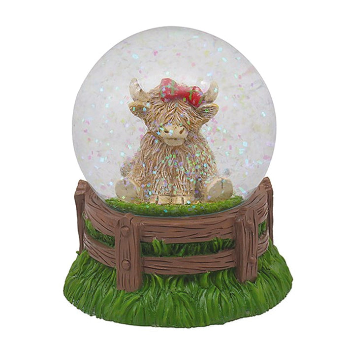 Waterball - Sitting Highland Cow with Tartan Bow in a Water Globe with Coloured Glitter