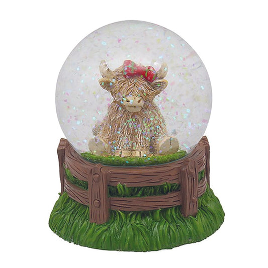 Waterball - Sitting Highland Cow with Tartan Bow in a Water Globe with Coloured Glitter